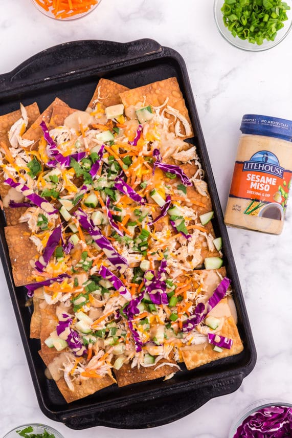 Tray of Asian Chicken Nachos topped with Litehouse Sesame Miso