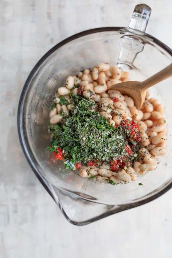 Mixing up a fresh batch of Marinated White Bean Salad