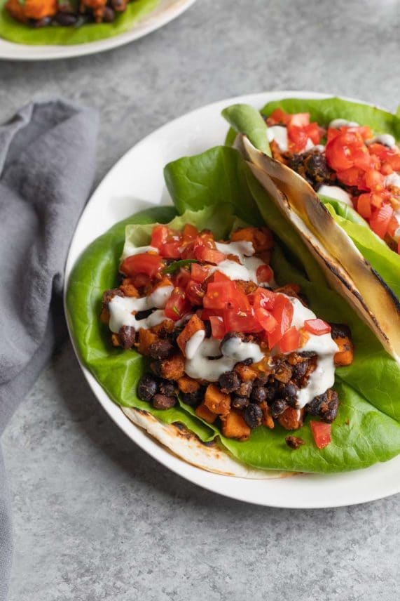 Serving up plates of Mexican Black Bean Wraps