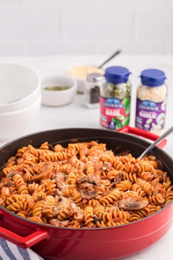 Mixing up a large batch of Mushroom Pasta