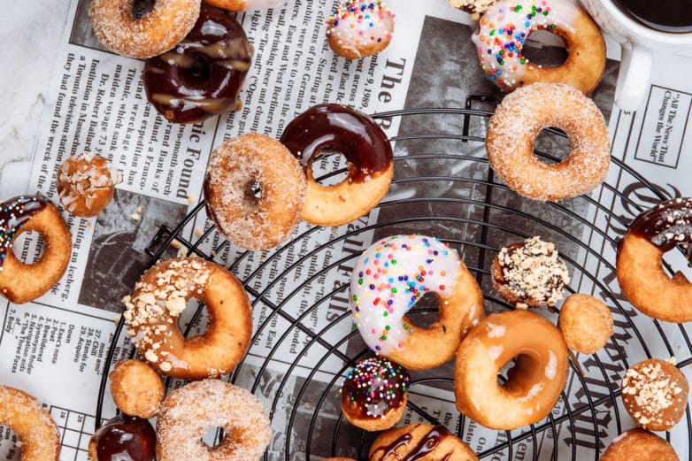 Dipped Cake Doughnuts on a baking rack