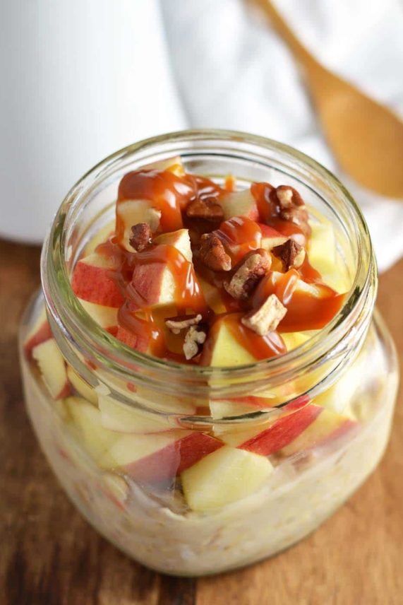 Drizzling Old Fashioned Caramel Dip on Caramel Apple Overnight Oats