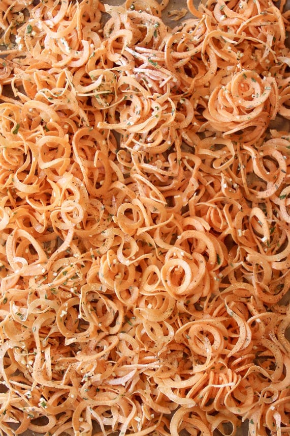 Preparing potatoes for Spiralized Sweet Potato Skillet