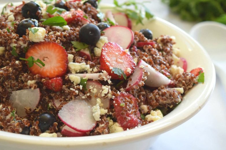 Bowl of Fresh Berry and Blue Cheese Quinoa Salad ready to serve