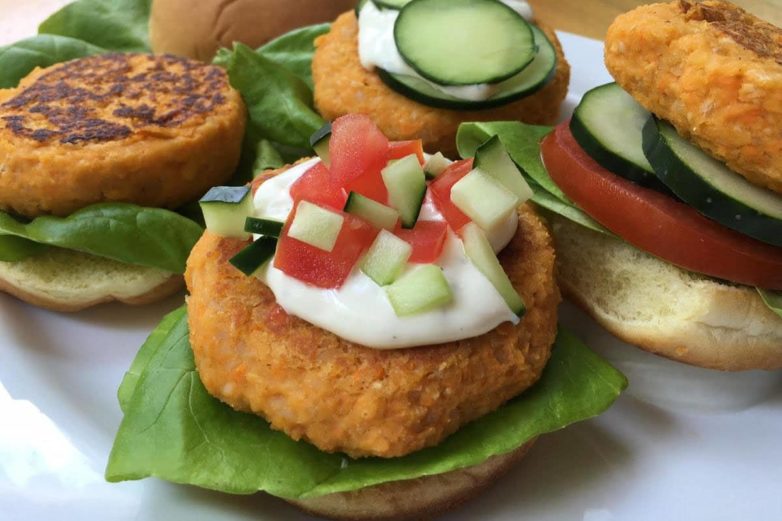 Adding finishing touches to Zesty Buffalo Ranch Chickpea Sliders