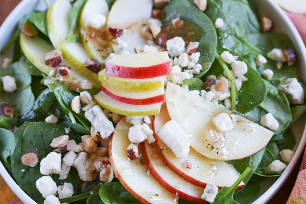 Adding the finishing touches to Fall Harvest Salad