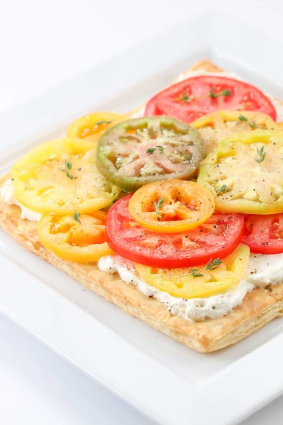 Layering tomatoes on Fresh Tomato Feta Tart