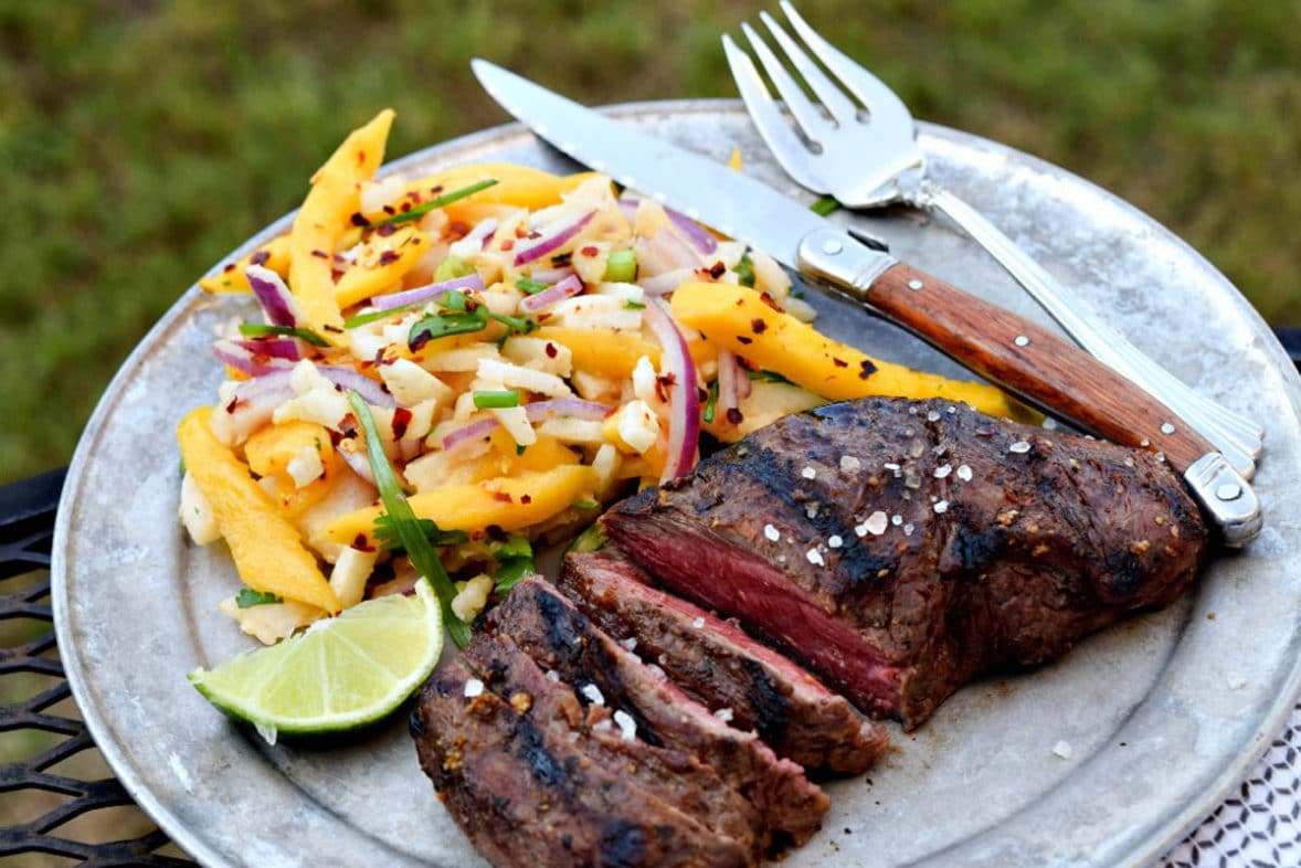 Fresh served Mango-Marinated Flat Iron Steak with Fruity Ginger Jicama Slaw