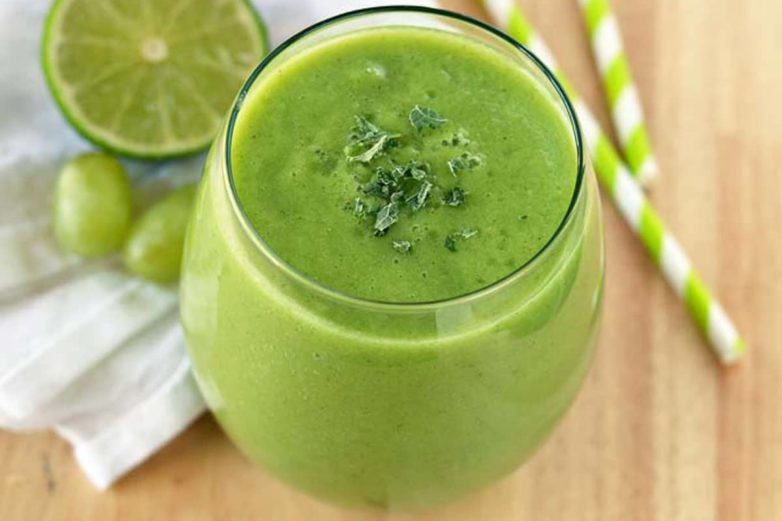 Glowing Green Smoothie with a slice of lime