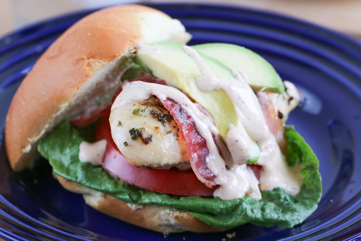 Adding toppings to a Grilled California Chicken Sandwich
