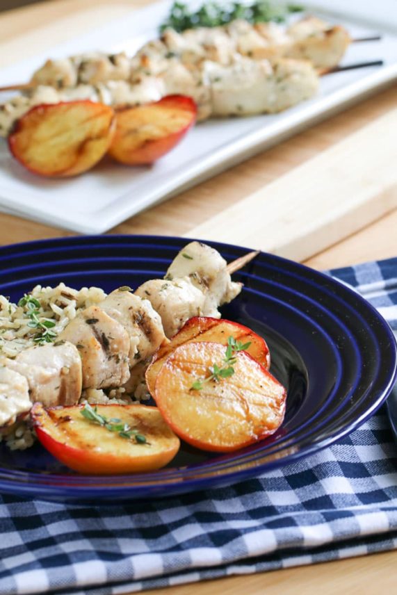 Plate of Grilled Sweet Peaches and Chicken Kebabs
