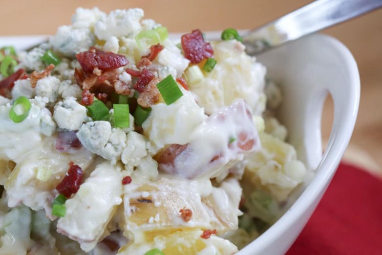 Mixing up a big batch of Red, White and Blue Cheese Potato Salad