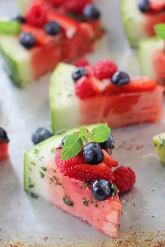 Adding the finishing touches to Mojito Marinated Watermelon Slices