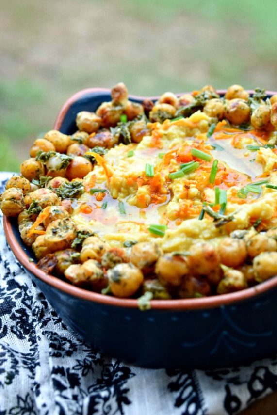 Heaping pan of Turmeric Curry Hummus with Minted Roast Chickpeas