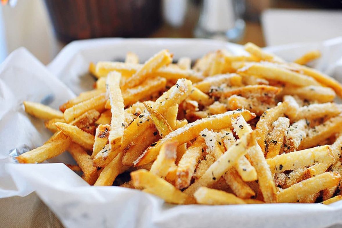 Ready to eat plate of Garlic Blue Cheese Fries