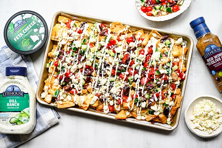 Greek Chicken Nachos Recipe with Litehouse Dill Ranch, Litehouse Feta Crumbles and Litehouse Red Wine Vinegar With Olive Oil